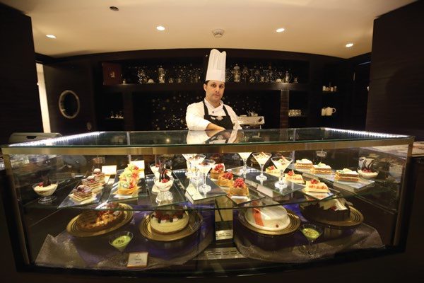 Chef at the pastry display