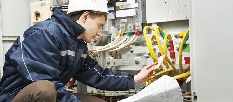 Technician working on wiring